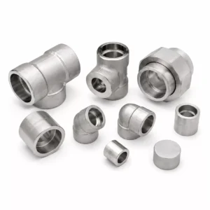 Assortment of Hastelloy forged fittings, including elbows, tees, and unions.