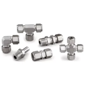 Various stainless steel tube fittings including tees, elbows, and couplings.