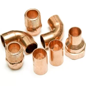 Copper pipe fittings, including elbows and couplings, for plumbing