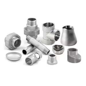 Collection of Monel tube fittings, including unions, elbows, and reducers.