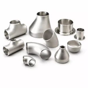 Various stainless steel butt weld fittings on white background