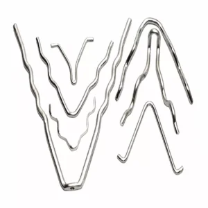Set of stainless steel V anchors on white background